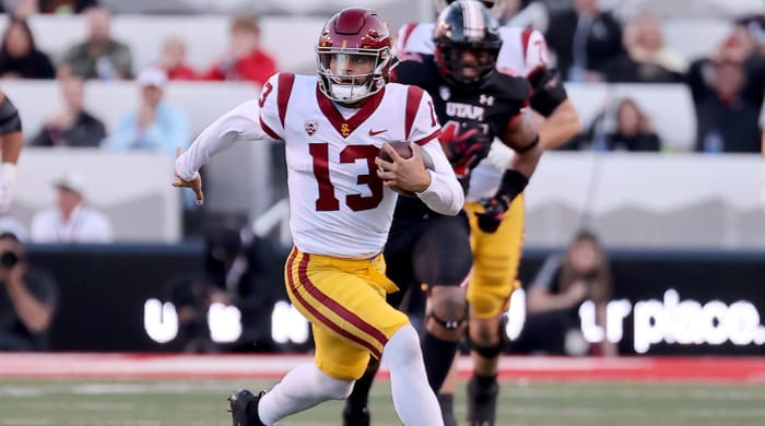 Oct 15, 2022; Salt Lake City, Utah, USA; USC Trojans quarterback Caleb Williams (13) runs against the Utah Utes in the first quarter at Rice-Eccles Stadium.